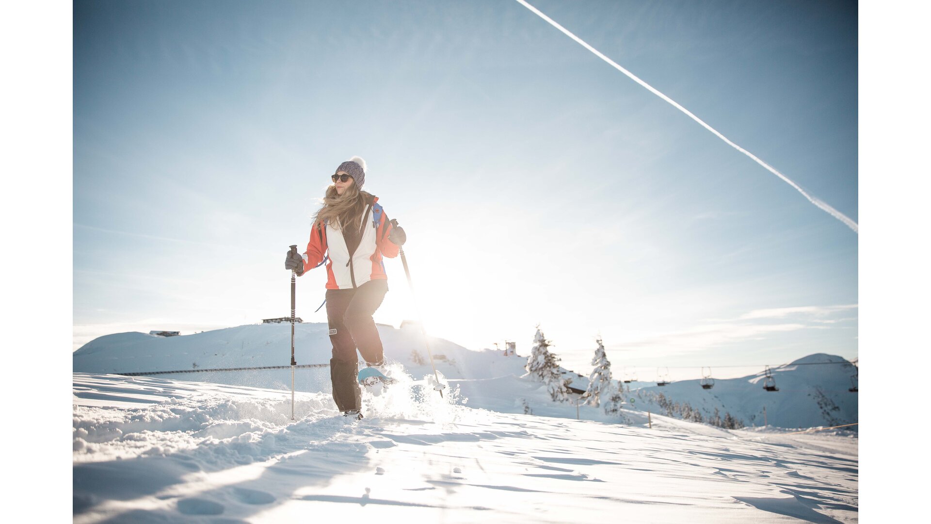 Schneeschuhwanderin auf der Schmittenhöhe. | © punkt & komma